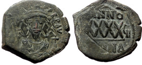 Phocas, AE, follis, (Bronze, 12.79 g. 29 mm.) Constantinople. 602-610 AD.
Obv: DN FOCAS PE[RP AVG], crowned, mantled bust facing, holding mappa and cr...