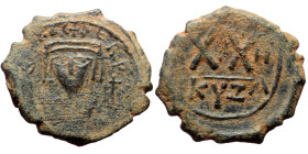 Phocas (602-610) AE Half Follis (Bronze, 23mm, 6.24g) Cyzicus, 1st officina, Date RY 2 (603/4). 
Obv: Crowned bust facing, wearing consular robes, and...