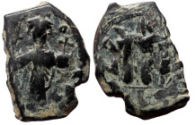 Arab-Byzantine, Umayyad Caliphate. Standing figure type. 680s-ca. 693. AE Fals (Bronze, 22mm, 4.35g) Dimashq (Damascus) 
Obv: Facing imperial bust, ho...