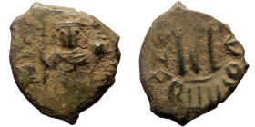 Arab-Byzantine (c. 660s-680s) AE Fals (Bronze, 22mm, 4.89g) 
Obv: Emperor standing facing, holding long cross and globus cruciger. 
Rev: Cursive M; cr...