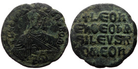 Leo VI the Wise (886-912) AE Follis (Bronze, 6.52g, 25mm) Constantinople 
Obv: +LEOn bAS ILEUS ROM', facing bust, wearing crown and chlamys, holding a...