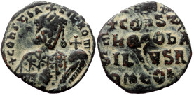 Constantine VII Porphyrogenitus, with Romanus I (913-959) AE Follis (Bronze, 22mm, 4.53g). Constantinople, 945-950. 
Obv: + COҺST ЬASIL ROM' , Crowned...