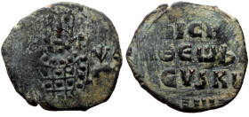 Nicephorus II Phocas. AE, Follis. (Bronze, 3.59 g, 20 mm.) Constantinople. 963-969 AD.
Obv: [NICIFR bASIL RW], crowned bust facing with short beard, w...