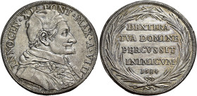 Roma.  

Piastra anno VIII/1684, AR 31,88 g. INNOCEN XI PONT MAX A VIII Busto a d. con camauro e stola ornata; sotto, HAMERANVS F (Giovanni Hamerani, ...