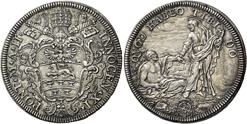 Roma.  

Testone anno II/1677, AR 9,61 g. INNOCEN·XI· – ·PONT·M·A·II· Stemma sor...