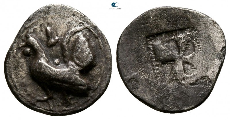 Sicily. Himera 530-482 BC. 
Obol AR

12mm., 0,75g.

Cock standing left, cla...