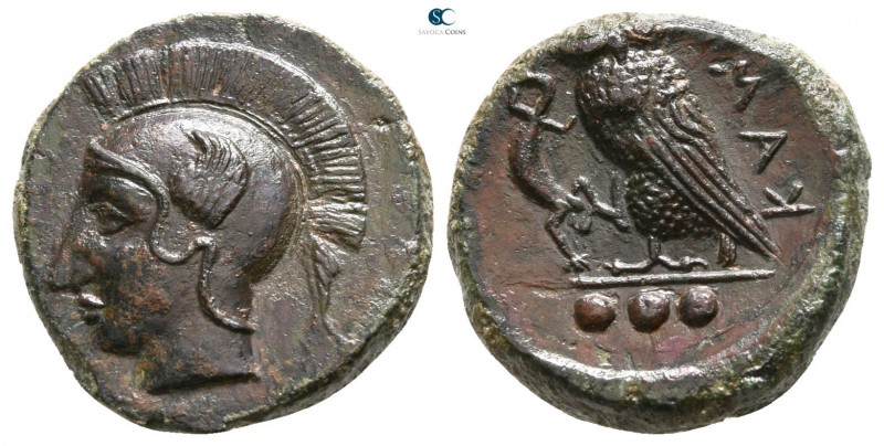 Sicily. Kamarina 420-405 BC. 
Tetras Æ

14mm., 2,94g.

Head of Athena left,...