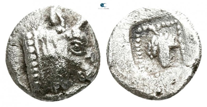 Macedon. Dikaia circa 450-420 BC. 
Hemiobol AR

6mm., 0,42g.

Head of bull ...
