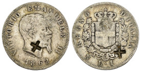Vittorio Emanuele II (1861-1878) - 1 Lira 1862 - Zecca: Napoli - Rara - Ag 900 - Gig# 62 -con contromarca a forma di croce greca su entrambi i lati 
...