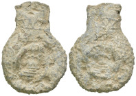 Weight 22.29 gr - Diameter 42 mm Pilgrim's Holy Water Ampulla with inscription on, 10th-14th century AD. A lead-alloy ampulla with tapering body, flar...