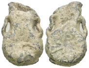 Weight 17.50 gr - Diameter 32 mm Pilgrim's Holy Water Ampulla with inscription on, 10th-14th century AD. A lead-alloy ampulla with tapering body, flar...