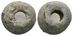 Bronze, Weight 24.21gr - Diameter 23 mm

Roman to Medieval (1st to 15th centuries) spindle whorl: The lead whorl is sub-circular in plan and in prof...