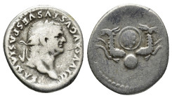 Divus Vespasianus Died 79 AD. AR Denarius (3.22 Gr. 17mm.). Rome
Laureate head right. 
Rev. Two capricorns, horned and bearded, on globe supporting sh...