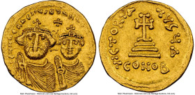 Heraclius (AD 610-641), with Heraclius Constantine. AV solidus (20mm, 4.47 gm, 7h). NGC Choice XF 4/5 - 4/5, edge marks. Constantinople, 4th officina,...