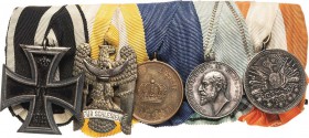 Ordensspangen
Spange mit 5 Auszeichnungen Preußen - Eisernes Kreuz 1914 2. Klasse . Deutsches Reich - Schlesisches Bewährungsabzeichen 2. Stufe. Preu...