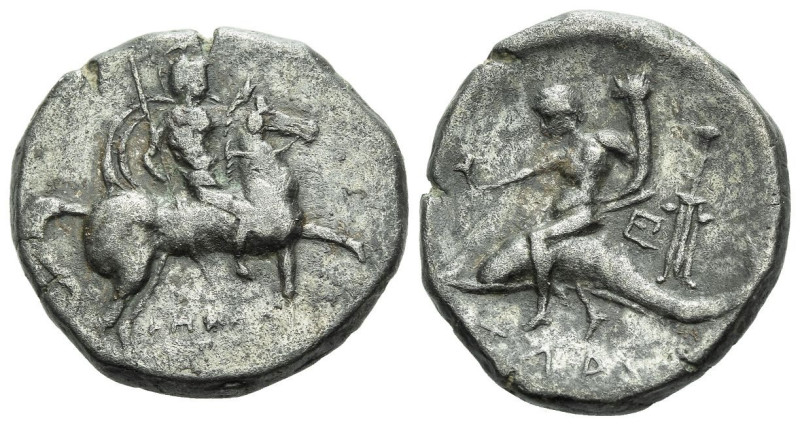 Calabria, Tarentum Nomos circa 272-240, AR 19.00 mm., 5.98 g.
Warrior, wearing ...