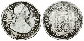 Carlos IV (1788-1808). 2 reales. 1803. Santiago. FJ. (Cal-1050). Ag. 6,15 g. Fuerte raya en anverso. Limpiada. BC. Est...45,00.