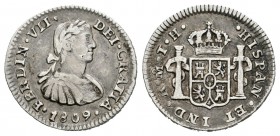 Fernando VII (1808-1833). 1/2 real. 1809. México. TH. (Cal-1336). Ag. 1,65 g. Busto imaginario. MBC-. Est...35,00.