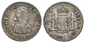Fernando VII (1808-1833). 1/2 real. 1813. México. HJ. (Cal-1343). Ag. 1,67 g. Busto imaginario. Pátina. Rayita en anverso. MBC. Est...35,00.