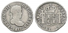 Fernando VII (1808-1833). 1/2 real. 1817. Potosí. PJ. (Cal-1370). Ag. 1,63 g. BC. Est...15,00.