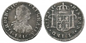Fernando VII (1808-1833). 1/2 real. 1816. Santiago. FJ. (Cal-1395). Ag. 1,51 g. Rayita en anverso. Escasa. BC+. Est...35,00.