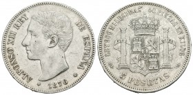 Alfonso XII (1874-1885). 5 pesetas. 1876*18-76. Madrid. DEM. (Cal-26a). Ag. 24,75 g. Variante oreja rayada. Rayitas. MBC+/MBC. Est...35,00.