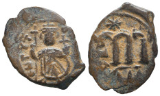 Byzantine Coins AE, 7th - 13th Centuries. 
Reference:

Condition: Very Fine

Weight: 3,8 gr
Diameter: 25 mm