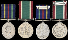 Civil Defence Long Service, British reverse, unnamed as issued, with investiture pin; and Women's Voluntary Service Medal, unnamed as issued, with inv...