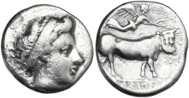 Greek Italy. Central and Southern Campania, Nola. AR Nomos, c. 400-385 BC. Obv. Diademed head of nymph right. Rev. Man-headed bull walking right; abov...