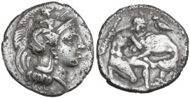 Greek Italy. Southern Apulia, Tarentum. AR Diobol, c. 325-280 BC. Obv. Helmeted head of Athena right, helmet decorated with Scylla hurling stone. Rev....
