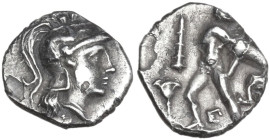Greek Italy. Southern Apulia, Tarentum. AR Diobol, c. 325-280 BC. Obv. Head of Athena left, wearing crested Corinthian helmet decorated with Scylla hu...