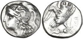 Greek Italy. Southern Apulia, Tarentum. AR Drachm, c. 281-272 BC. Obv. Head of Athena left with hair flowing down behind. Rev. Owl standing on thunder...