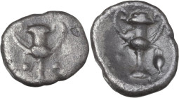 Greek Italy. Southern Apulia, Tarentum. AR Obol, c. 280-228 BC. Obv. Kantharos; around, three pellets (two visible). Rev. Kantharos; to right, amphora...