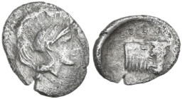 Greek Italy. Southern Lucania, Thurium. AR Hemiobol (?), c. 443-400 BC. Obv. Helmeted head of Athena right. Rev. ΘΟΥ. Forepart of bull right, head fac...