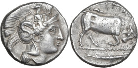 Greek Italy. Southern Lucania, Thurium. AR Stater, c. 400-350 BC. Obv. Helmeted head of Athena right, helmet decorated with Skylla holding trident. Re...