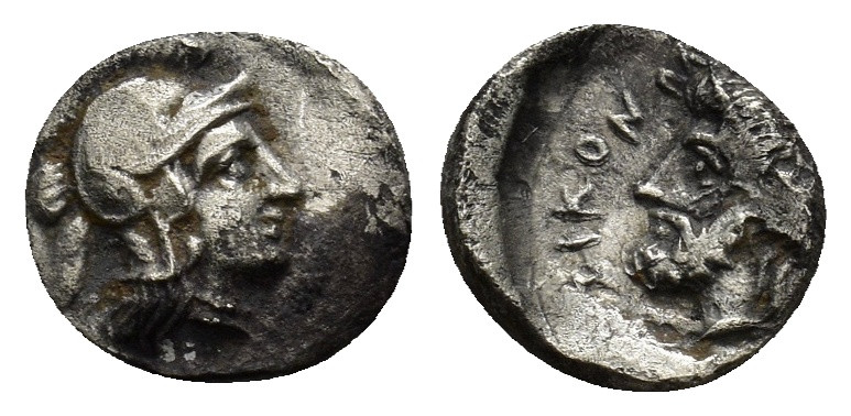 Uncertain Greek Silver Coins. (0.7 Gr. 9mm.)
 Helmeted bust of Athena right. 
Re...