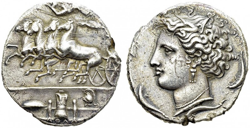 Dyonisos I, 406-367 BC. Silver Decadrachm 400 BC. Obv. Fast quadriga driven left...