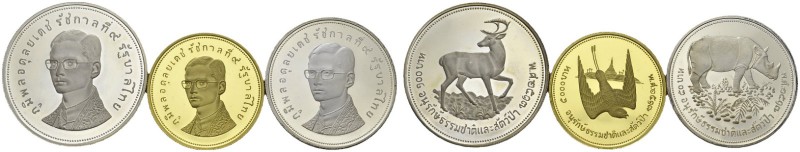 Rama IX, 1946-2016. Set of three coins 2517 (1974) : 50 Baht, 100 Baht and 5000 ...