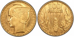 FRANCE
III° République (1870-1940). 100 francs or Bazor 1933.
Av. Tête de Marianne avec casque ailé à gauche. Rv. Epi de blé sous la valeur.
G.1148...