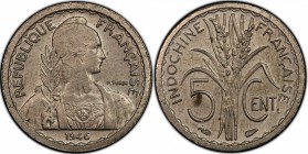 INDOCHINE
5 cent 1946, flan en argent.
Av. La République à droite. Rv. La valeur en-dessous de deux épis de blé.
Lec. manque. 2,62 grs. 
PCGS MS 6...