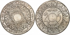 MAROC
Moulay Yussaef Ier (1330-1346 AH / 1912-1927). 25 centimes 1912, essai en cupro-nickel non perforé.
Av. Etoile chérifienne. Rv. Valeur au cent...