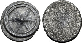 Etruria, Populonia AR Unit. 4th century BC. Wheel with long crossbar, central pin supported by two curved struts / Blank. EC I, 19 (O2); HN Italy 126;...