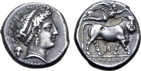 Campania, Neapolis AR Didrachm. Circa 320-300 BC. Diophanes, magistrate. Diademed head of nymph to right, wearing triple-pendant earring and pearl nec...