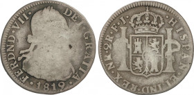 Ferdinand VII
2 Reales. 1819. NUEVO REINO. F.J. 6,32 grs. Busto de Carlos IV. MUY ESCASA. AC-935. BC+.