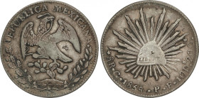 Mexico
8 Reales. 1858. GUANAJUATO. P.F. 26,85 grs. AR. (Resellos). Pátina irregular. KM-377.8. MBC-.