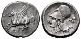 Corinthia. Corinth. Stater. 400-350 a.C. (Bcd-Corinth 115). (Calciati-402). (Ravel-1040). Anv.: Pegasus flying left, below Ϙ. Rev.: Head of Athena on ...