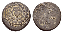 PONTOS.Amisos.(Circa 105-63 BC).Ae.

Obv : Aegis with Gorgon's head at center.

Rev : AΜΙΣΟΥ.
Nike advancing right, holding wreath and palm branch, be...