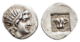 CARIA. Rhodes. (Circa 190-170 BC).Drachm.

Obv : Radiate head of Helios right.

Rev : APTEMΩN / P - O / Δ - I.
Rose with bud to right; Isis crown to l...