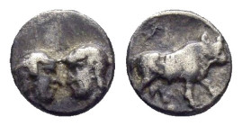 CARIA. Uncertain.(5th century BC).Hemiobol.

Obv : Bare female and male (or female) heads facing one another.

Rev : Bull standing right within incuse...