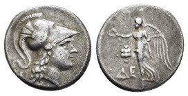 PAMPHYLIA. Side. (Circa 205-190 BC).Tetradrachm.

Obv : Head of Athena right, wearing crested Corinthian helmet.

Rev : ΔE.
Nike advancing left, holdi...
